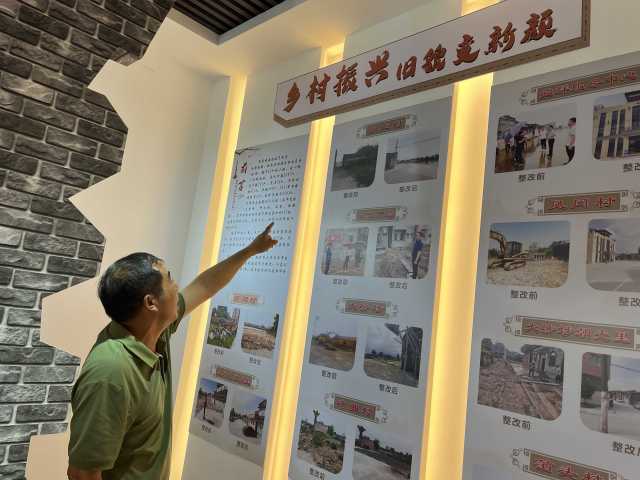 平原村書記吳振述向記者講述村子蝶變的經(jīng)過。伍思懿 攝 